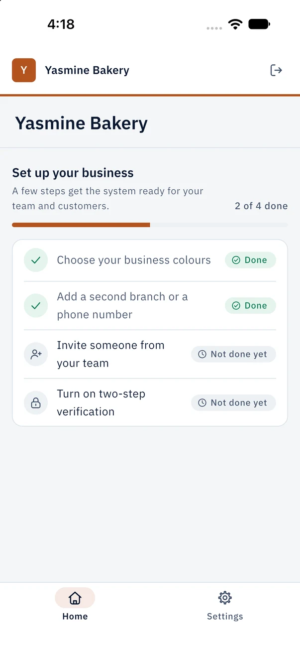 Development build of the iOS app on the simulator: the home screen of a fictional business, Yasmine Bakery, in its orange colour, with its setup checklist.
